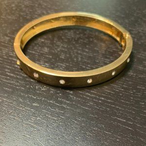 Gold bracelet with silver gems